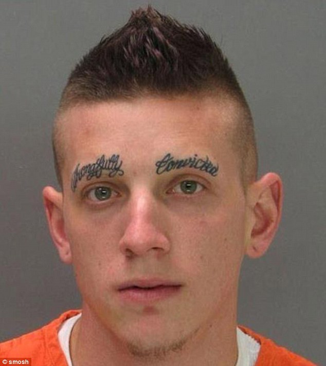This man decided to make a statement in his mugshot and had the words 'wrongfully convicted' tattooed on 