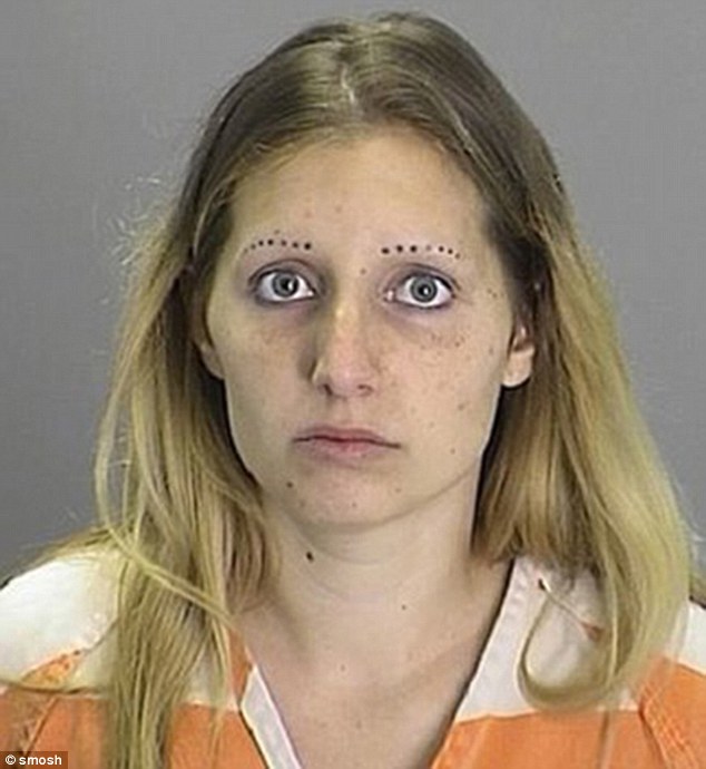 Another mugshot shows a female with dots instead of brows but they do appear to be quite even on either side